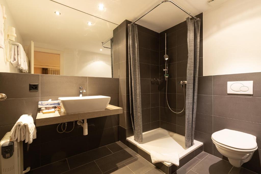 Koupelna v ubytování Hotel Central, SPA & LOUNGE BAR