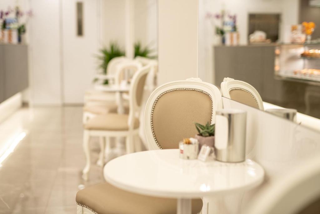 Posezení v ubytování L'Opera Rooms & Suite