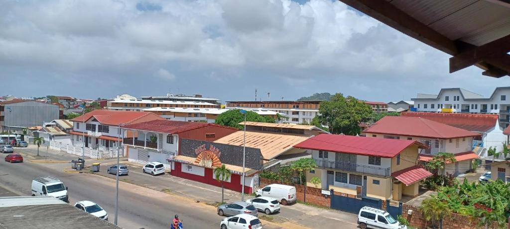 an overhead view of a town with cars parked on a street at NANA A33 Appartement 2 Chambres Climatisées cuisine équipée Netflix in Cayenne