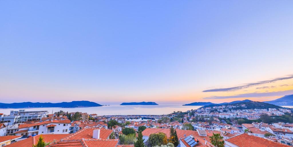 a view of a city at sunset at Luna Kaş in Kaş