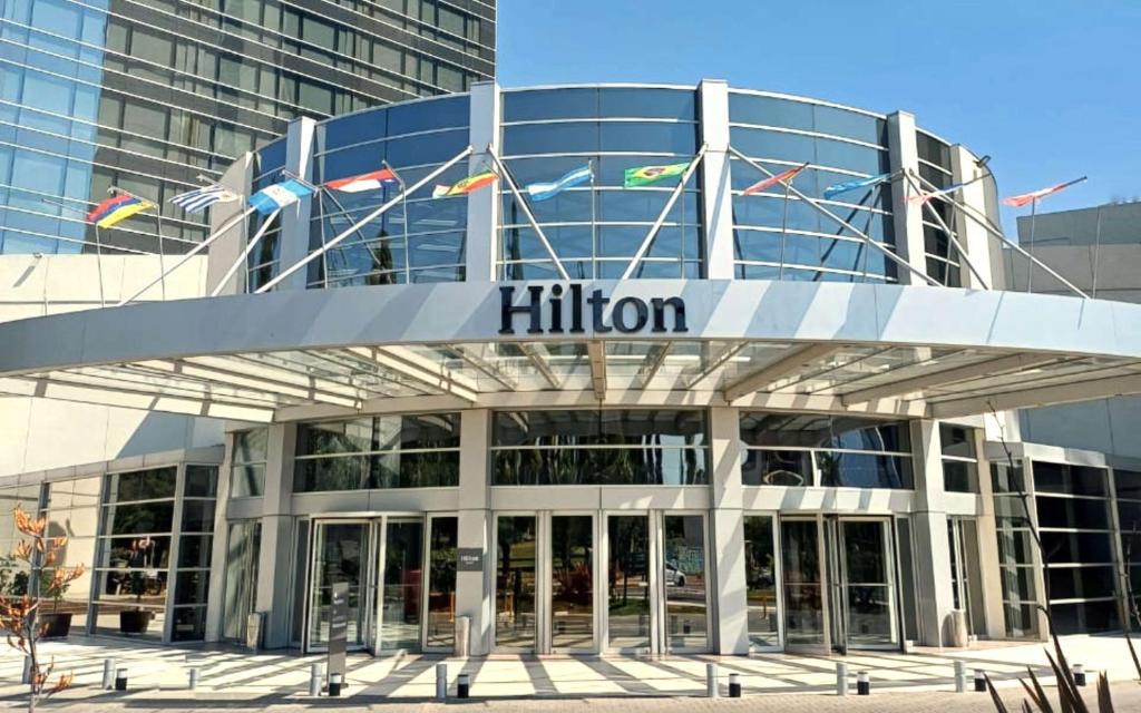 a building with the hilton sign in front of it at Hilton Mendoza in Mendoza