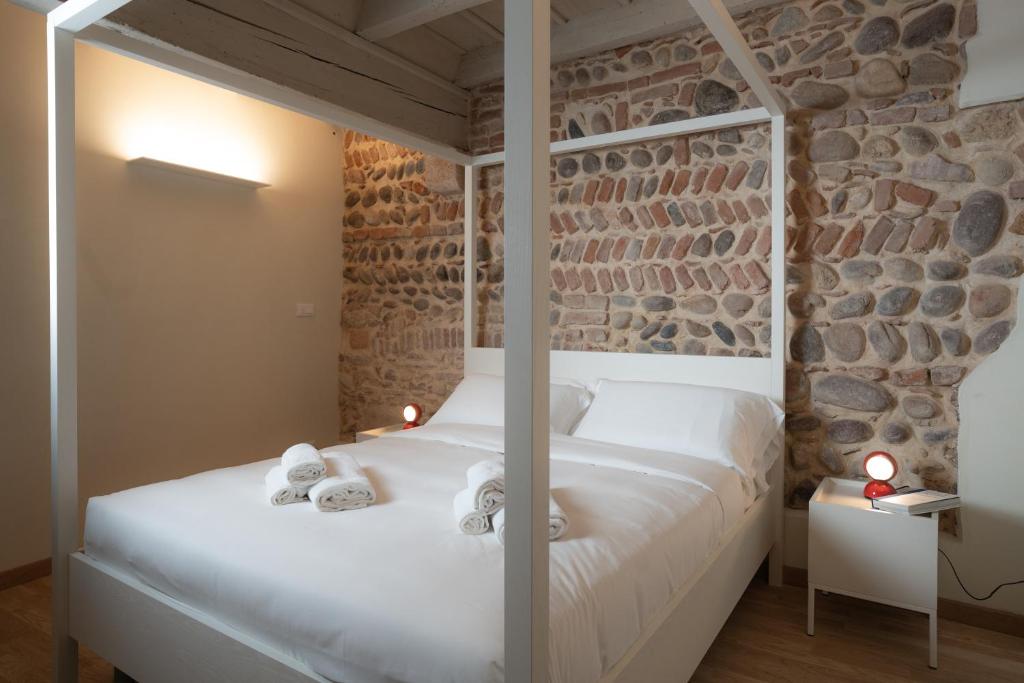 Postel nebo postele na pokoji v ubytování Verona Design