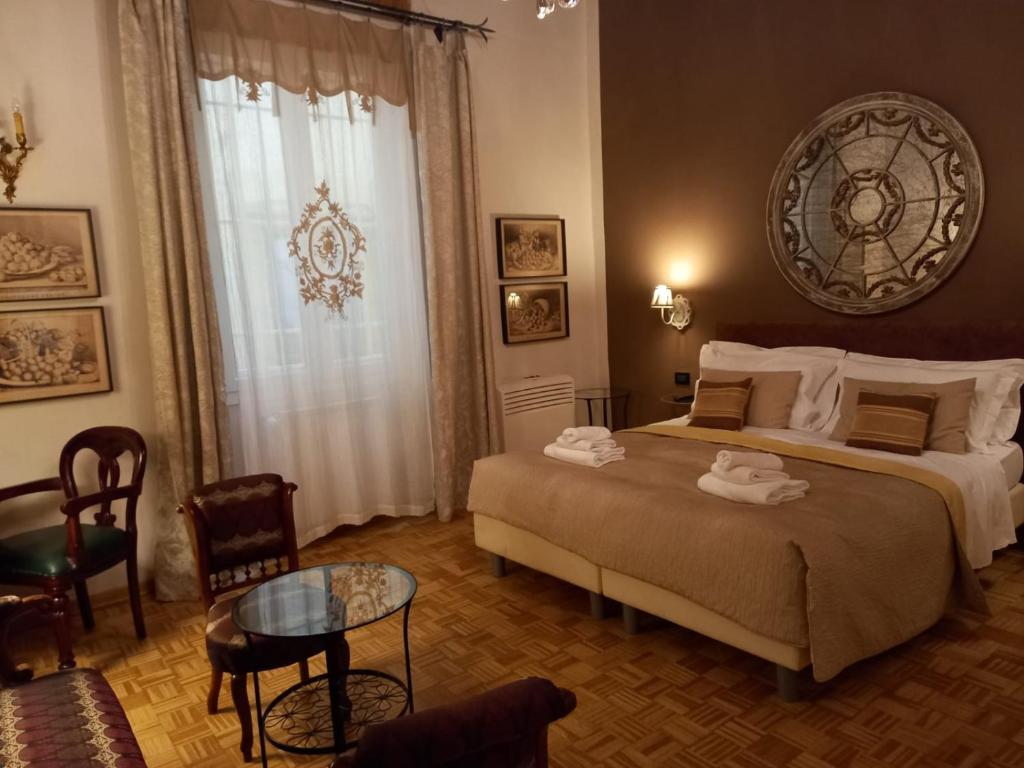 Postel nebo postele na pokoji v ubytování B&B Cimatori