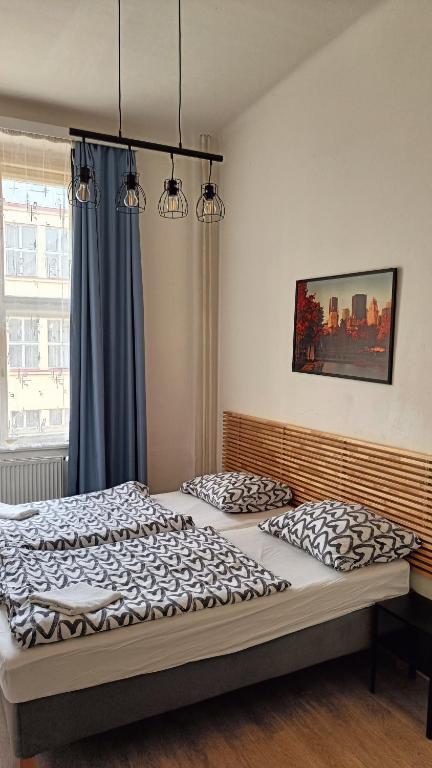 Postel nebo postele na pokoji v ubytování A Plus Hostel - Centrum