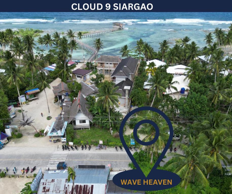 an aerial view of a resort with the olympic symbol at Wave Heaven 9 meters to cloud 9 in General Luna