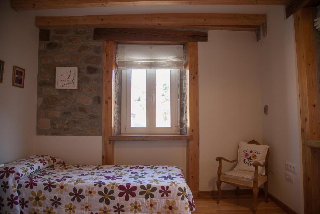 Posteľ alebo postele v izbe v ubytovaní La Casa de Santa Olalla