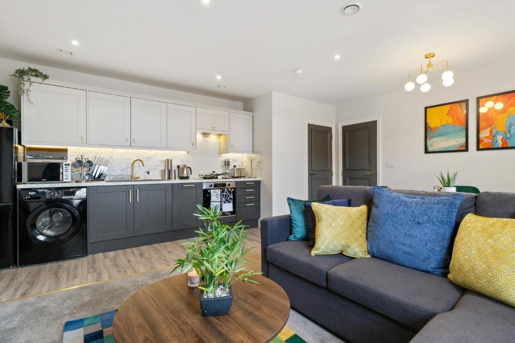 a living room with a couch and a table at WhiskAwayStays - Victoria House - Apartment 4 in Worcester