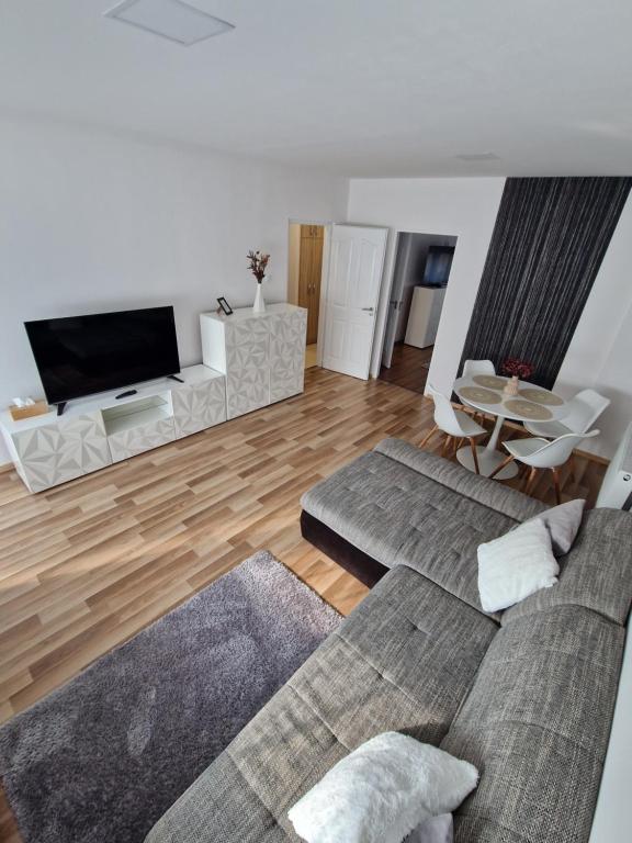 Telewizja i/lub zestaw kina domowego w obiekcie Mátrix apartman