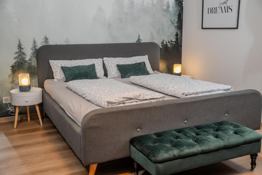 Postel nebo postele na pokoji v ubytování Gästehaus J. Baumann