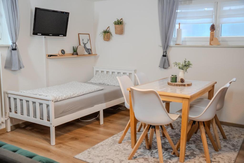 Postel nebo postele na pokoji v ubytování Gästehaus J. Baumann