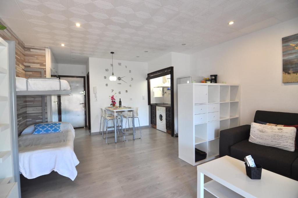 A bed or beds in a room at RNET - Puerto Simona 1-9 Roses Costa Brava