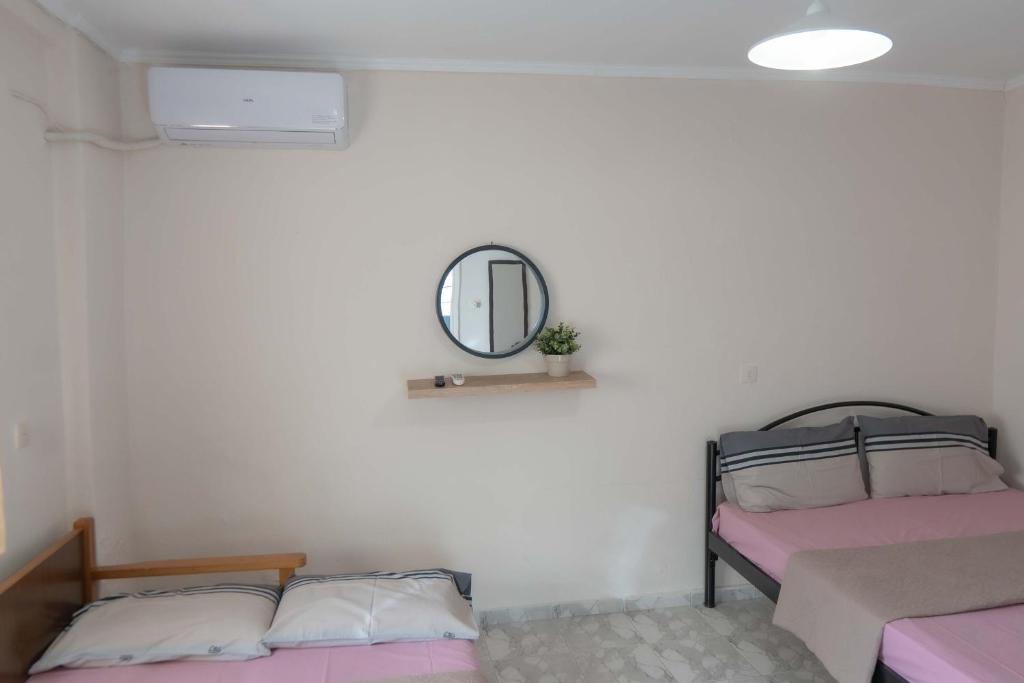 Postel nebo postele na pokoji v ubytování memories house