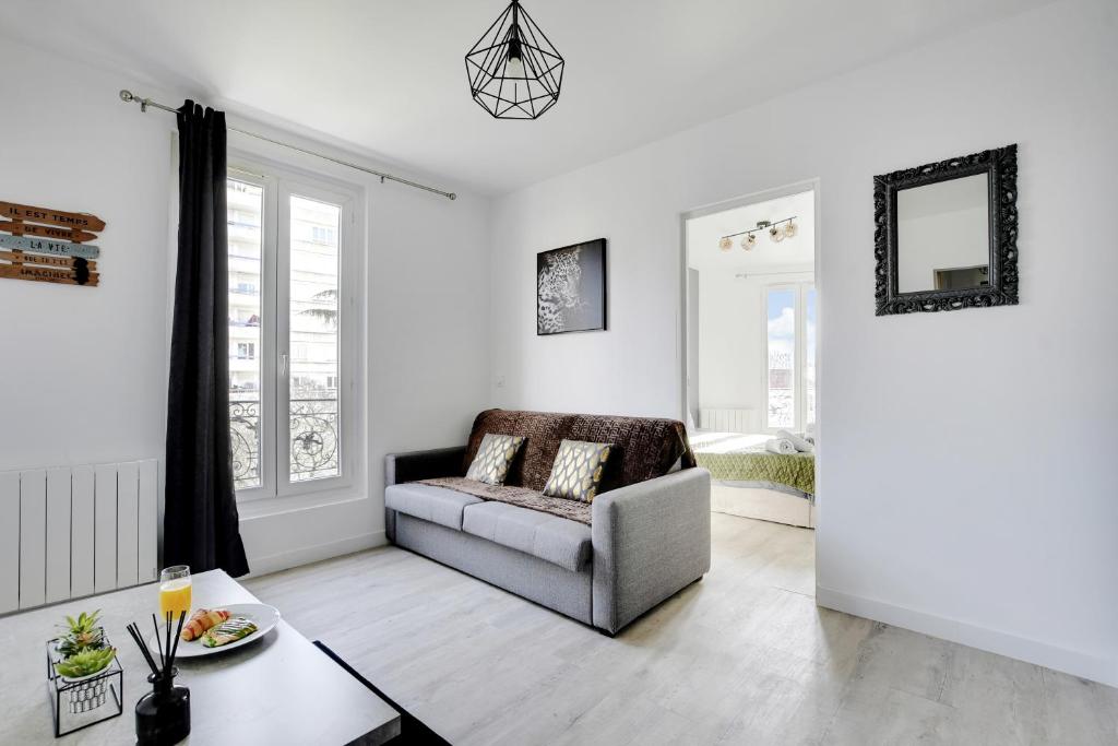 Area soggiorno di Appartement Suite 43 aux Portes de Paris