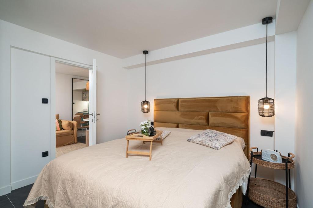 Postel nebo postele na pokoji v ubytování Apartments Alex