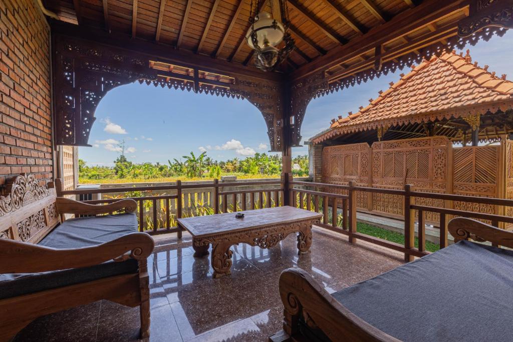 Balkón nebo terasa v ubytování Billys Ayodya Villa