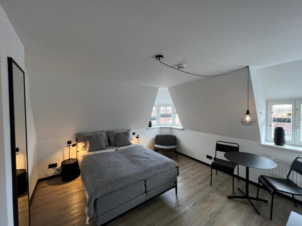 Postel nebo postele na pokoji v ubytování Studiowohnung 6 in Buxtehude
