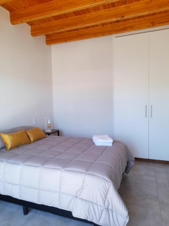 Postel nebo postele na pokoji v ubytování Moderno dúplex en Tunuyán