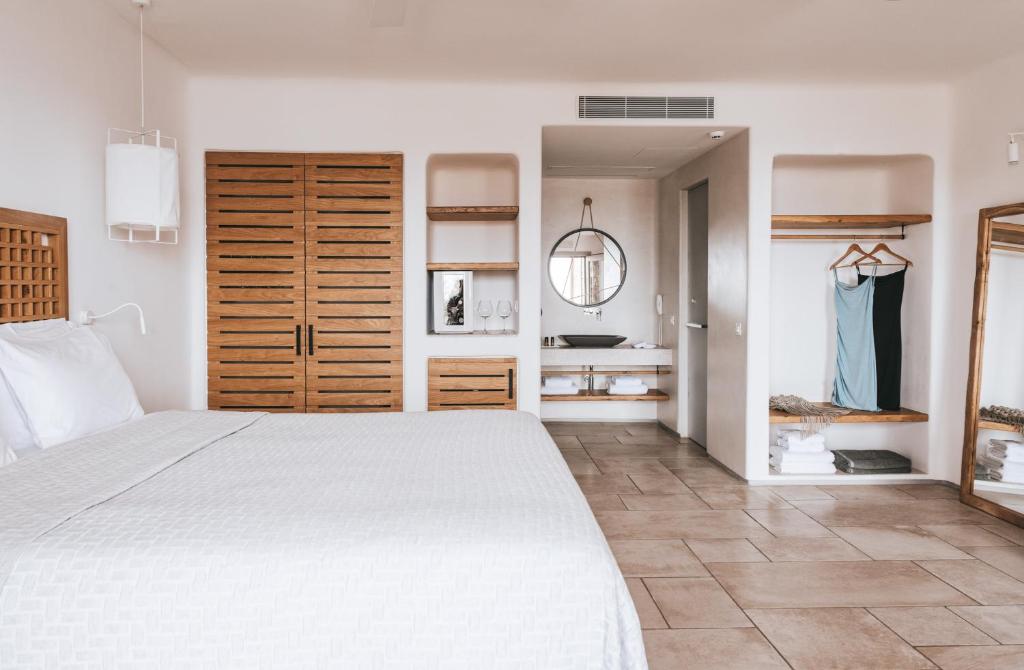 Postel nebo postele na pokoji v ubytování Alissachni Mykonos
