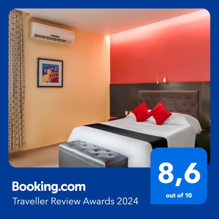 Postel nebo postele na pokoji v ubytování Veracruz Suites Hotel