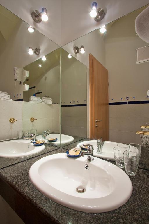 Koupelna v ubytování Hotel Scaletta