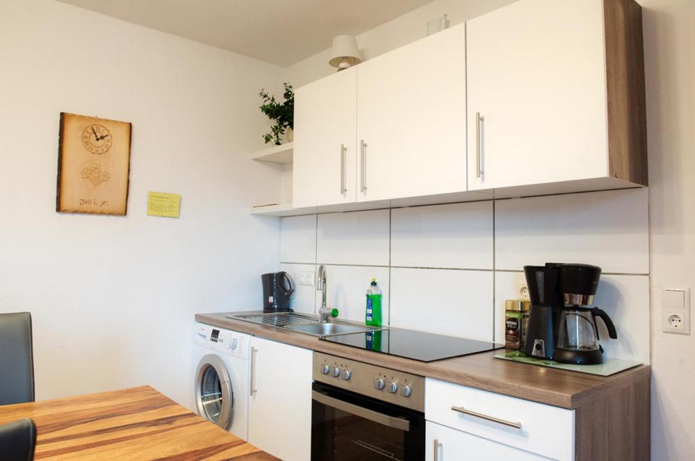 Kuchyň nebo kuchyňský kout v ubytování Ferienwohnung Prof. Dehmer