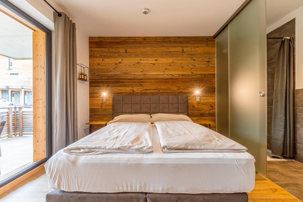 Posteľ alebo postele v izbe v ubytovaní Kreischberg Suites by ALPS RESORTS