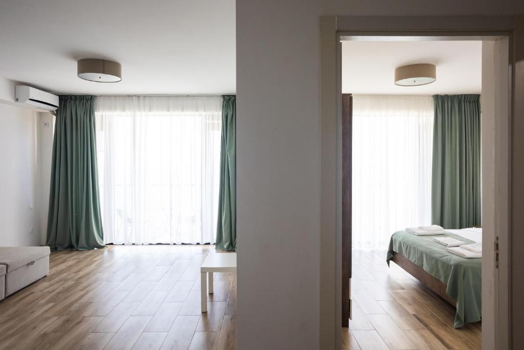 Postel nebo postele na pokoji v ubytování Hotel Bratislava