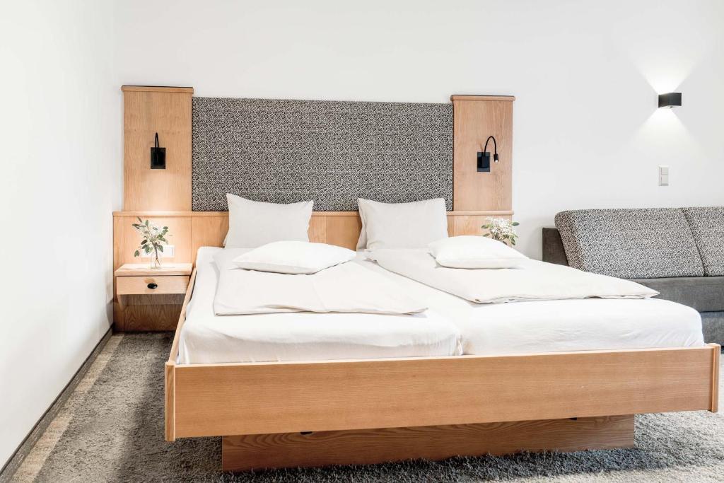 Postel nebo postele na pokoji v ubytování B&B Hotel DIE BARBARA