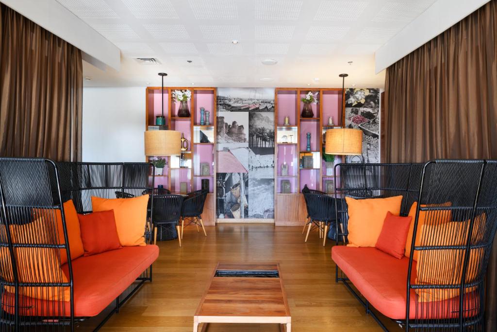 Posezení v ubytování Noga by Isrotel Collection