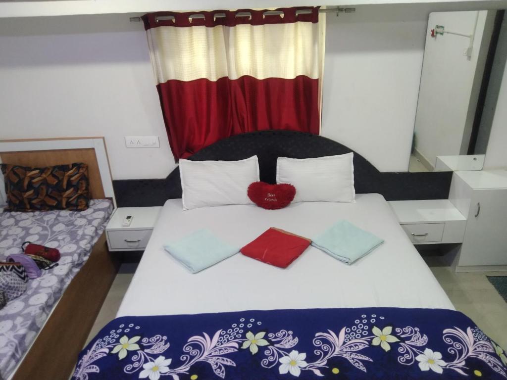 Кровать или кровати в номере APPU GOLD STAY