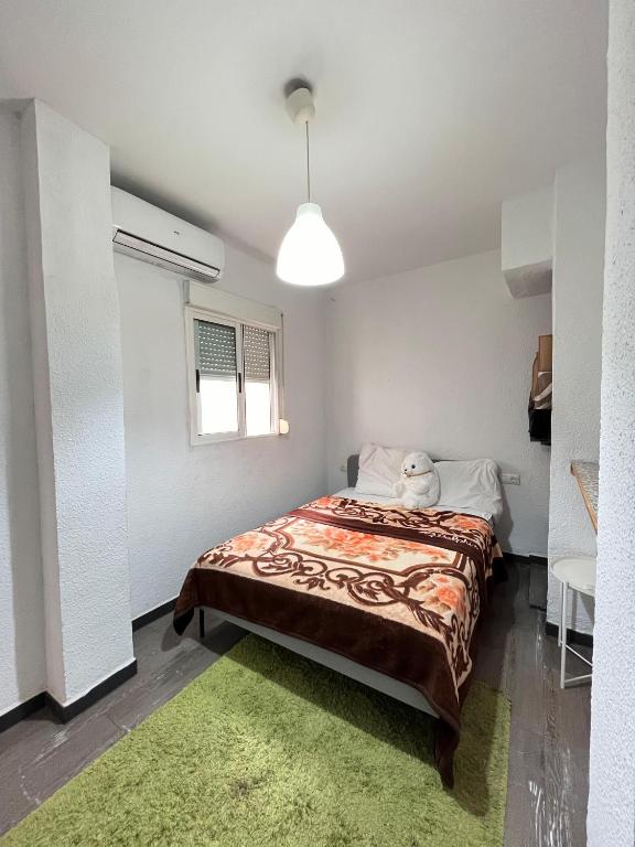 Postel nebo postele na pokoji v ubytování HotSpot Valencia