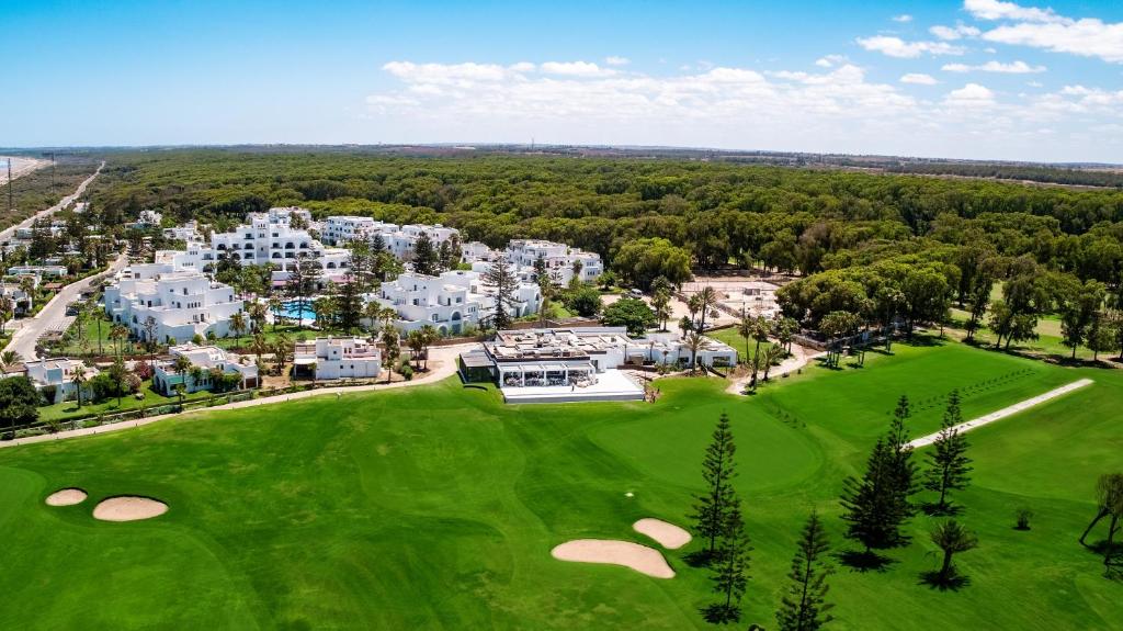 an aerial view of the golf course at a resort at Pullman Mazagan Royal Golf & Spa in El Jadida