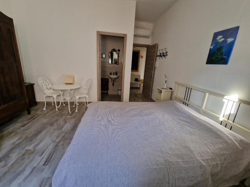 Postel nebo postele na pokoji v ubytování La Barabbata