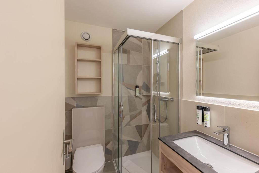 Koupelna v ubytování Hotel Brienz