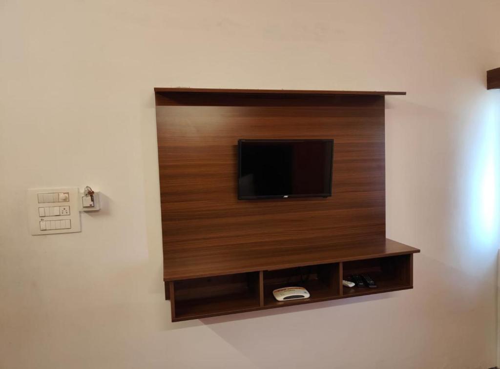 TV a/nebo společenská místnost v ubytování Hotel New Cresent park