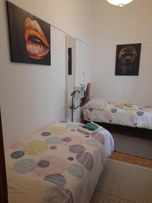 Postel nebo postele na pokoji v ubytování Cèc & Evita