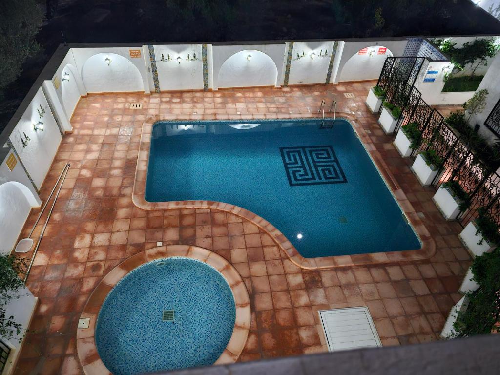 Bazén v ubytování Villa Jasmin Super equipped apartment with Garden, Swimming pool, Sea nebo v jeho okolí