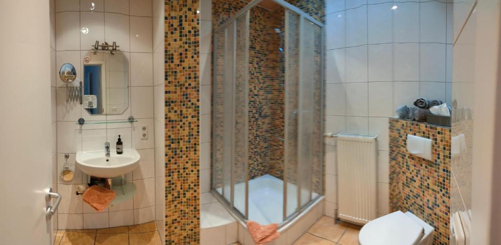 Koupelna v ubytování Gästezimmer / Weingut Peter