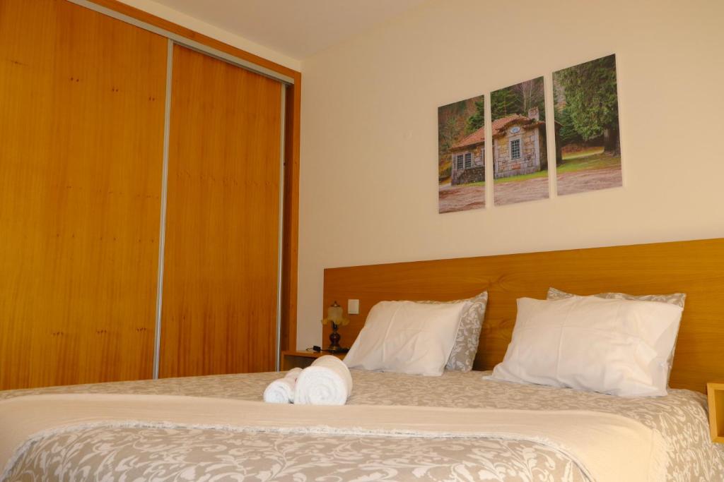 Postel nebo postele na pokoji v ubytování Outeiro do Moinho