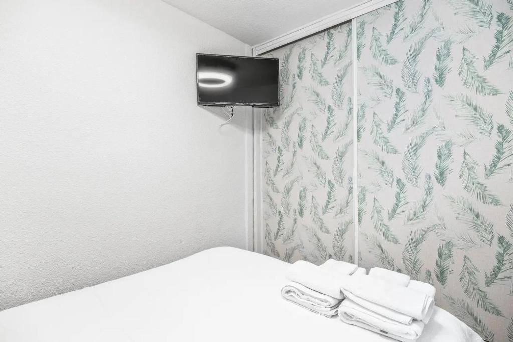 TV a/nebo společenská místnost v ubytování Alco apartamentos: Playmon Park