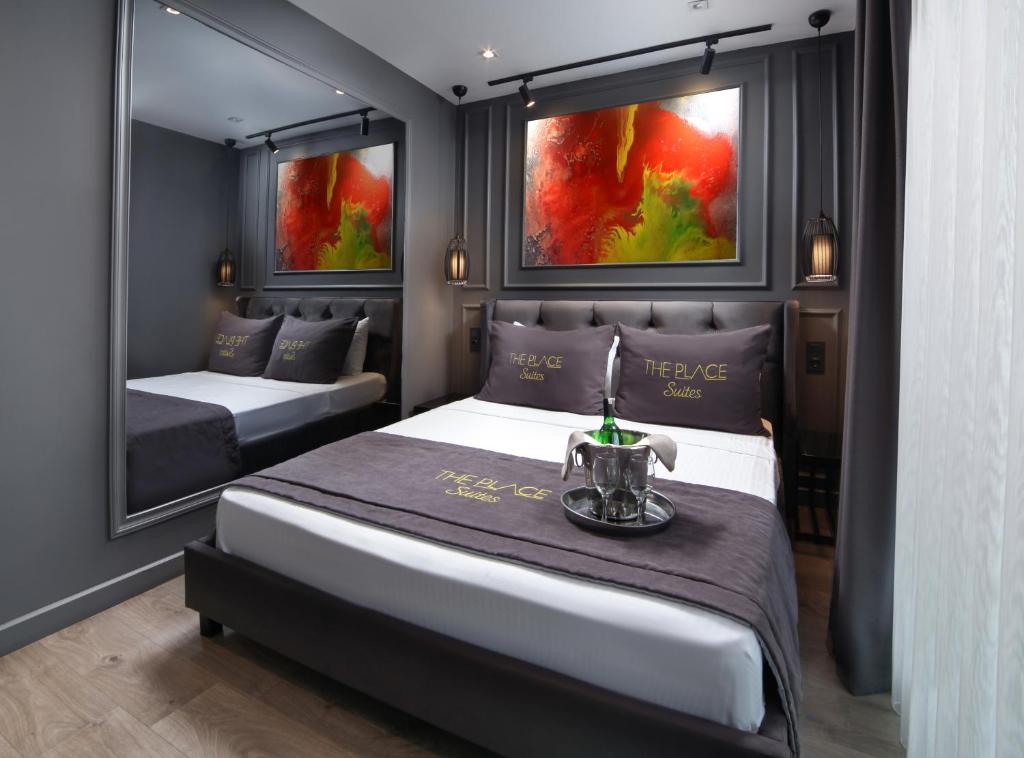 A bed or beds in a room at Ataşehir The Place Suites