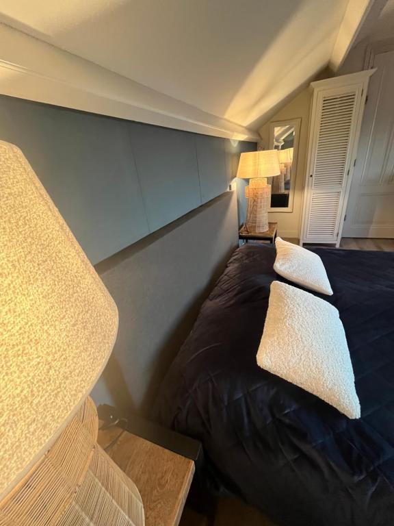 Postel nebo postele na pokoji v ubytování B&B De Koog Texel