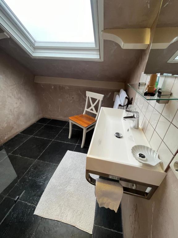 Kuchyň nebo kuchyňský kout v ubytování B&B De Koog Texel