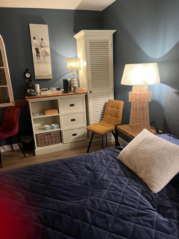 Postel nebo postele na pokoji v ubytování B&B De Koog Texel