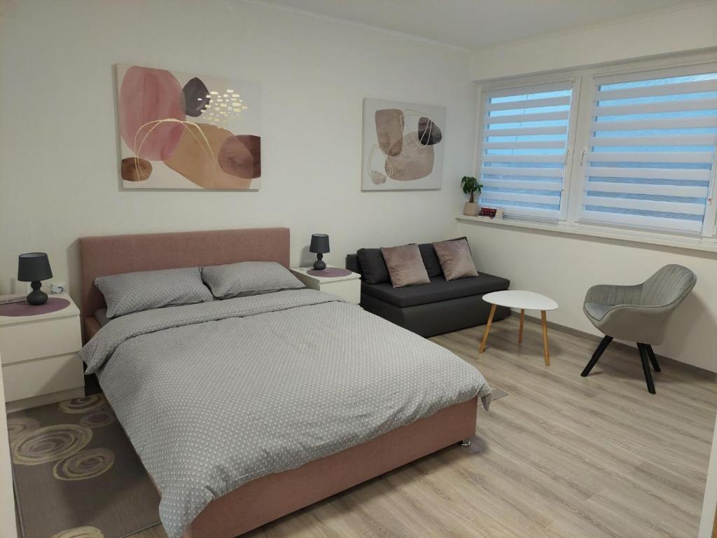 Llit o llits en una habitació de Studio apartman TARA