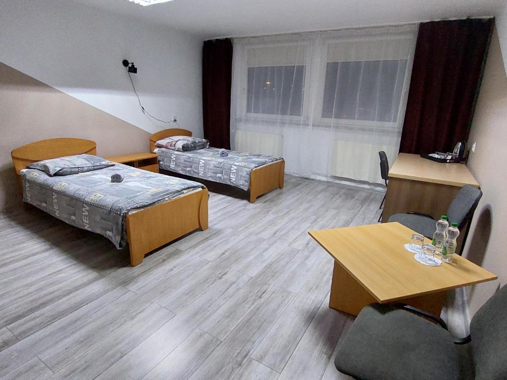 Postel nebo postele na pokoji v ubytování Noclegi Bytom - OPAL