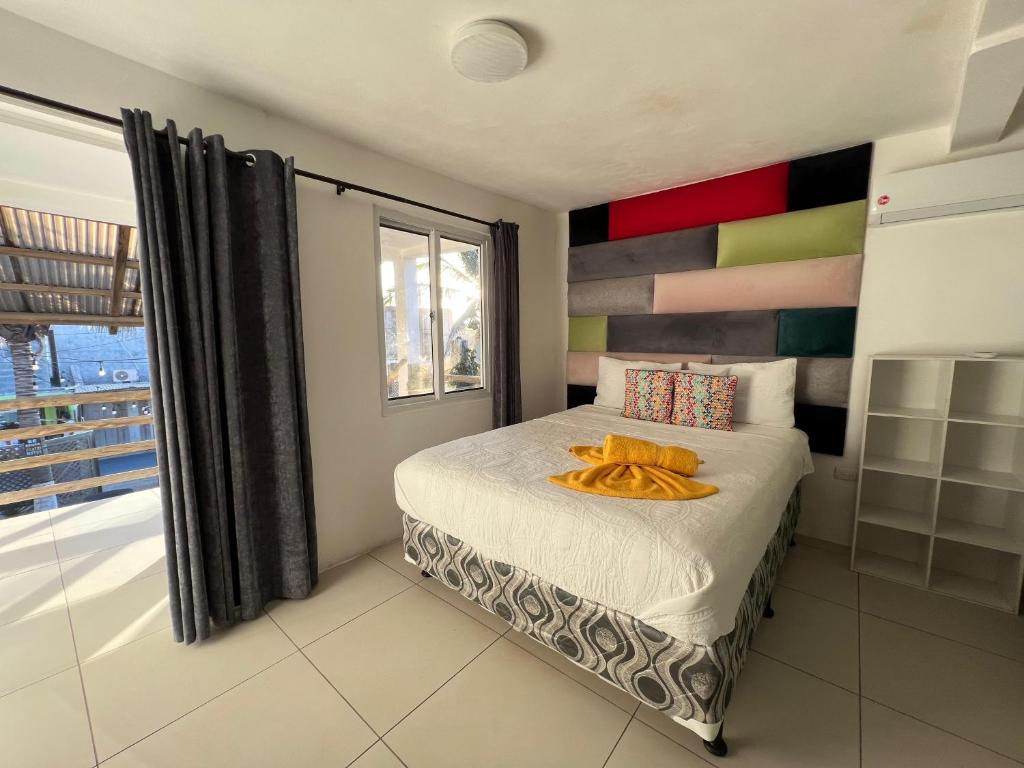 Una cama o camas en una habitación de Casa Pacific Blue Hawaii