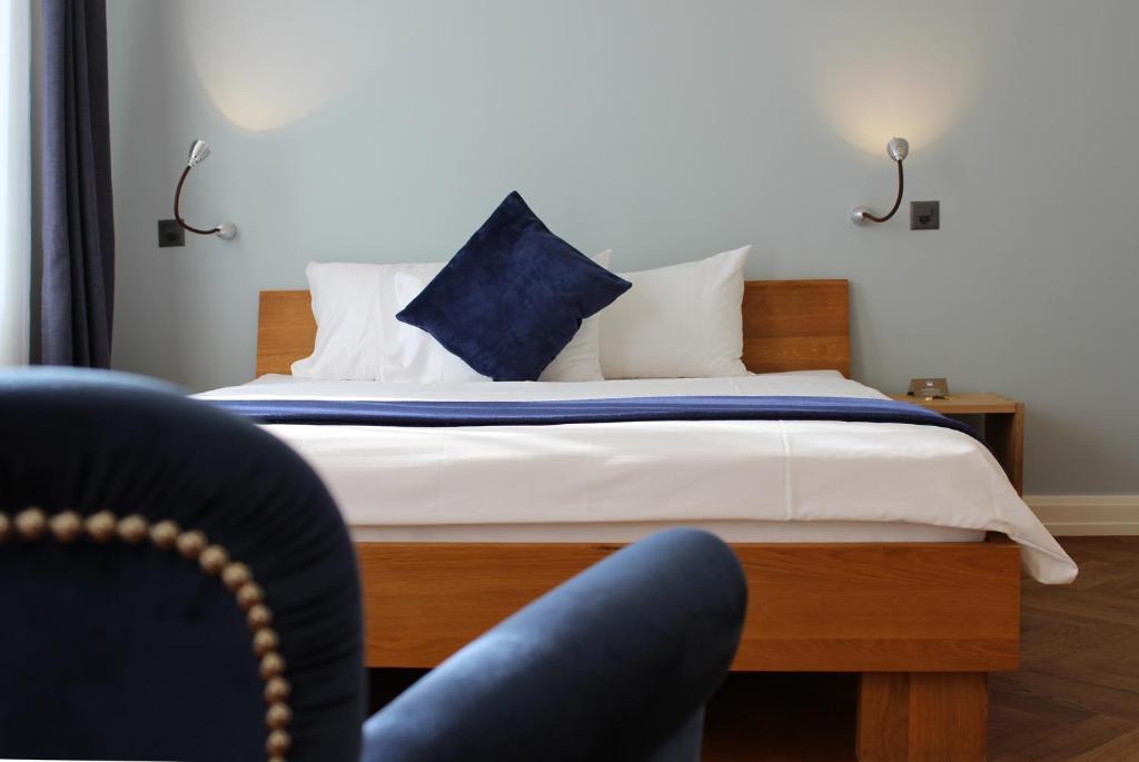 Llit o llits en una habitació de Boutique Hotel NI-MO