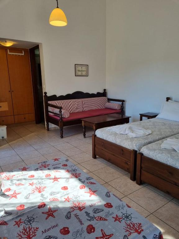 Postel nebo postele na pokoji v ubytování Irida Apartments -EX BLAZIS HOUSE