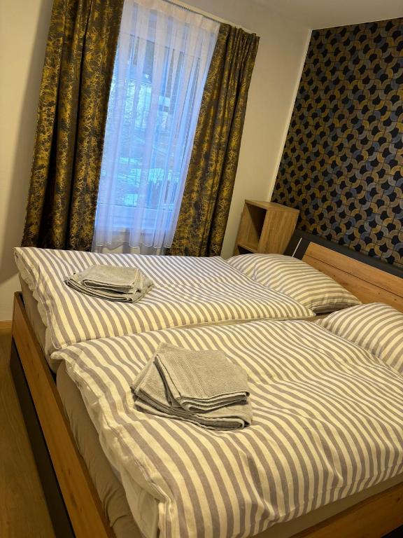 Postel nebo postele na pokoji v ubytování Kupferdachl